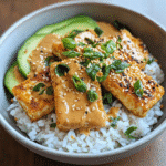 Sesame-Crusted Tofu with Coconut Rice: Crispy, Creamy & Perfect 4 Sesame-Crusted Tofu with Coconut Rice in ceramic bowl